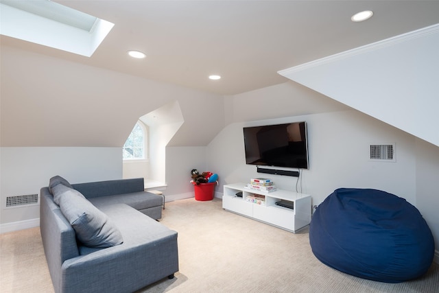 living room with lofted ceiling with skylight and carpet flooring