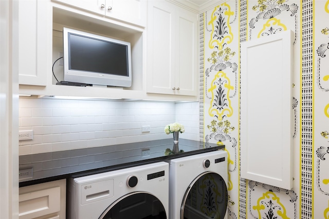 laundry area with cabinets and independent washer and dryer