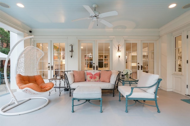 sunroom with french doors and ceiling fan