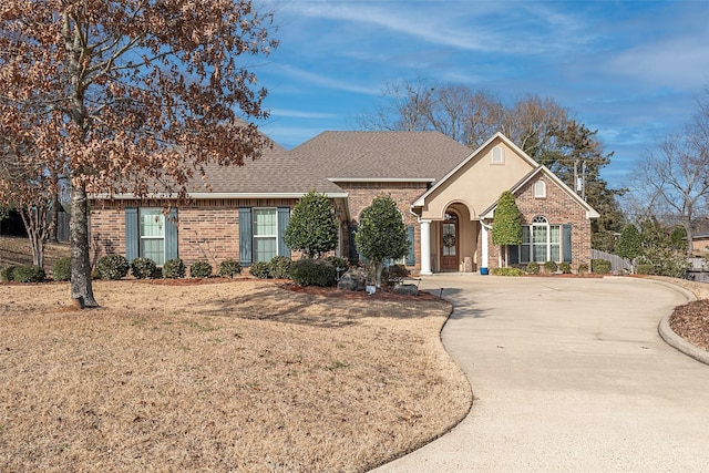 view of front of home with a front yard