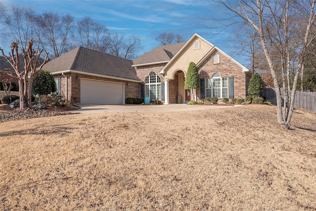 front facade with a garage