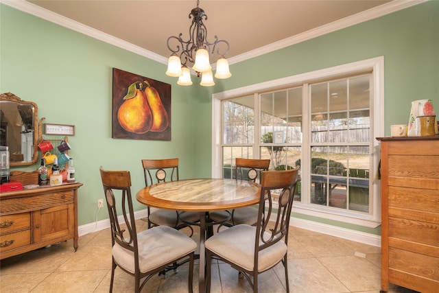 tiled dining space featuring ornamental molding and a chandelier