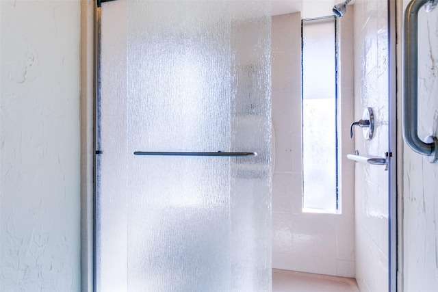 bathroom with an enclosed shower