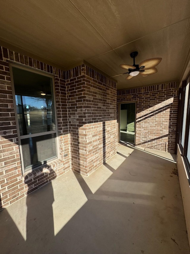 view of patio featuring ceiling fan