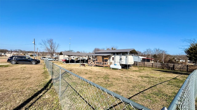 view of yard featuring a carport