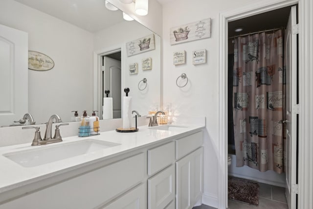 bathroom with vanity, tile patterned floors, and shower / bath combo