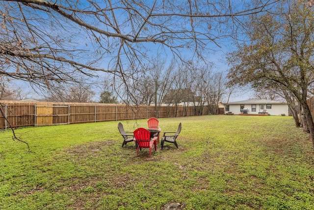 view of yard featuring a fenced backyard