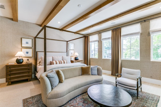 bedroom featuring beamed ceiling