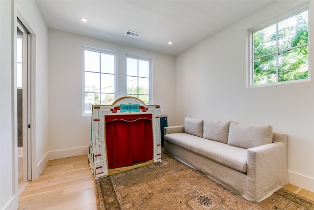 sitting room with light wood-type flooring