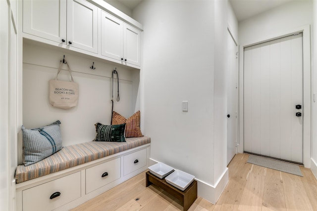 mudroom with light hardwood / wood-style flooring