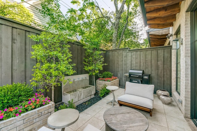 view of patio / terrace featuring a grill