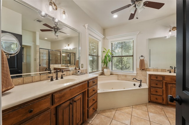 bathroom with vanity, tile patterned floors, plus walk in shower, and ceiling fan