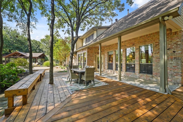 wooden deck featuring a gazebo