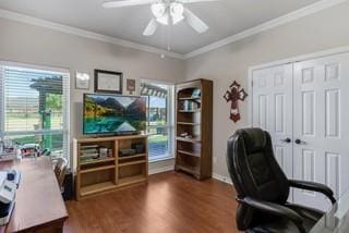 home office featuring crown molding, dark wood-type flooring, and ceiling fan