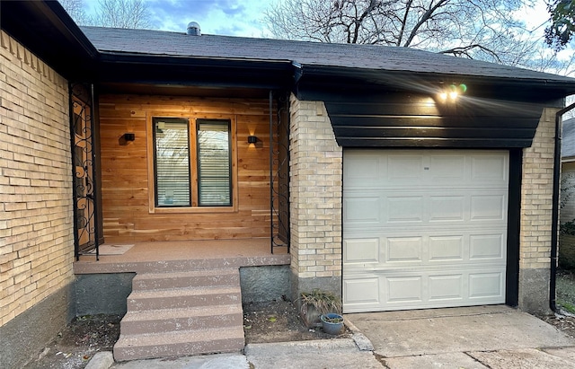 entrance to property with a garage