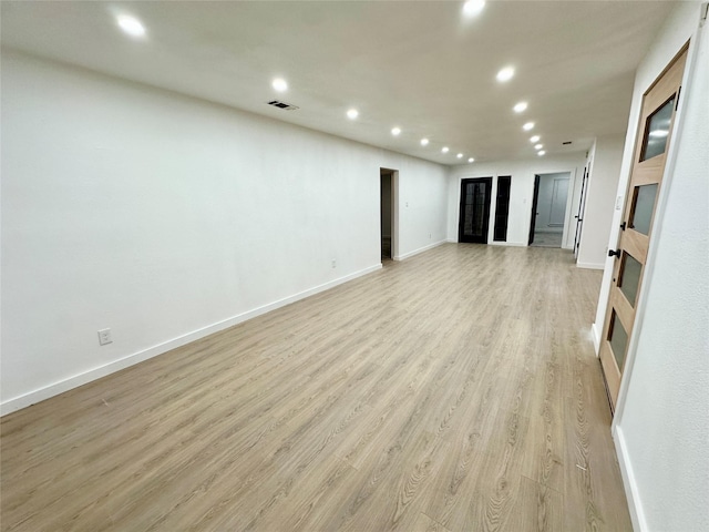 interior space with light hardwood / wood-style flooring