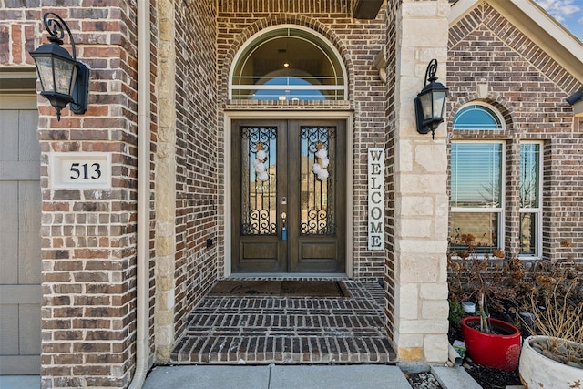 entrance to property featuring french doors