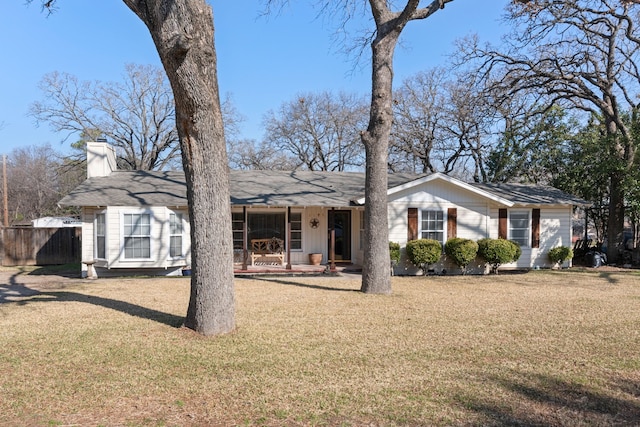 ranch-style home with a front yard