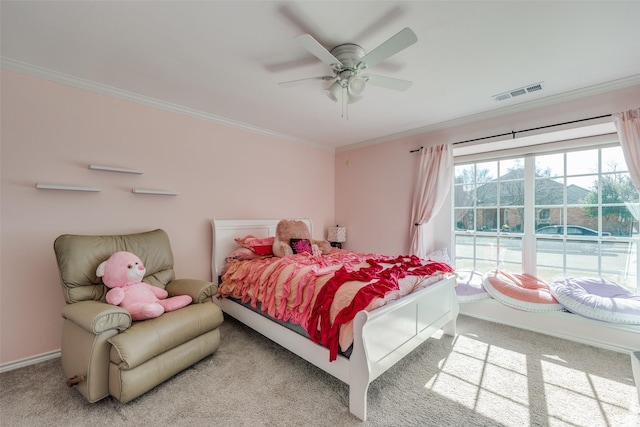 bedroom featuring crown molding, ceiling fan, and carpet