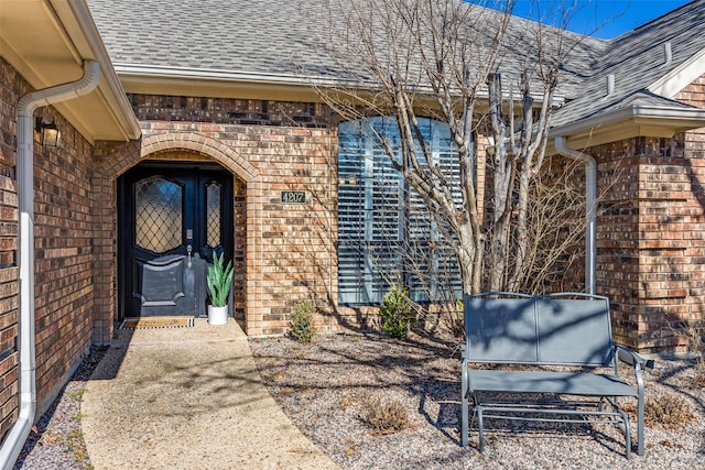 entrance to property with a patio area