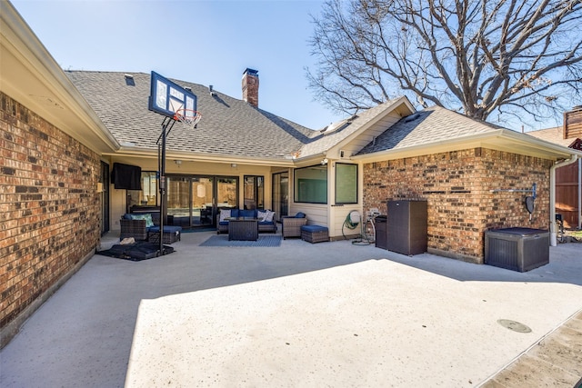 exterior space featuring a patio and an outdoor hangout area