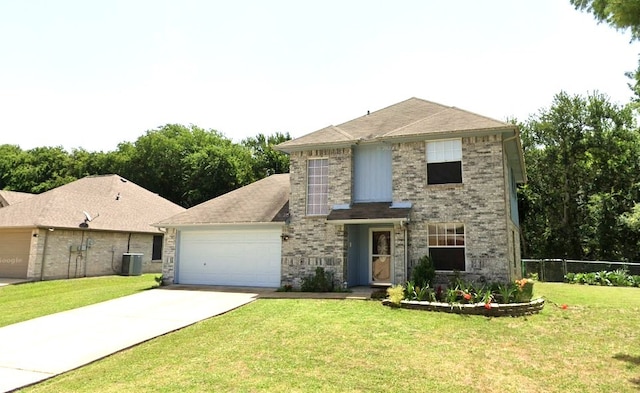 view of front of property featuring cooling unit, a garage, and a front lawn