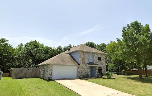 view of front facade with a garage and a front lawn