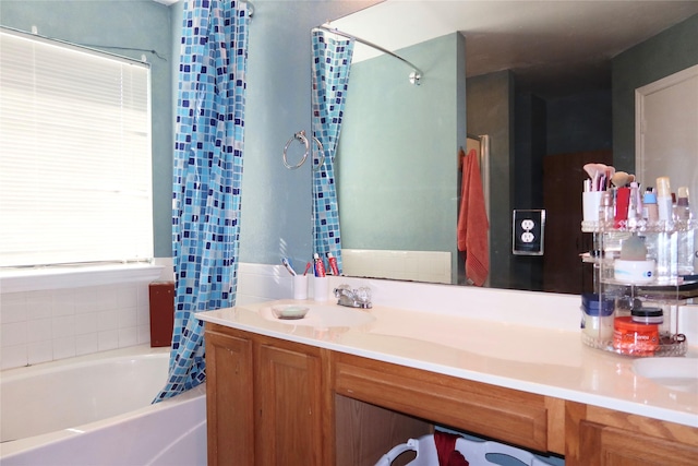 bathroom featuring vanity and shower / bath combo