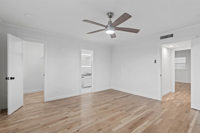 empty room with crown molding, light hardwood / wood-style flooring, and ceiling fan