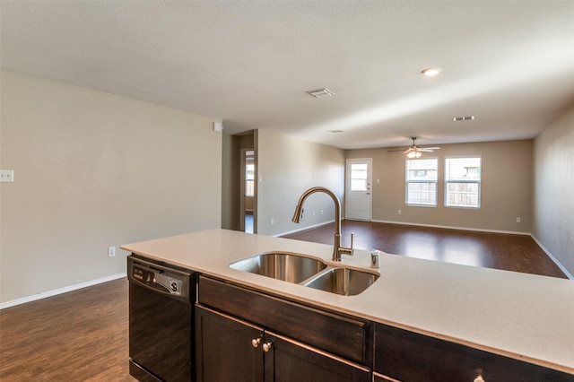 kitchen featuring dark hardwood / wood-style floors, black dishwasher, sink, and dark brown cabinets