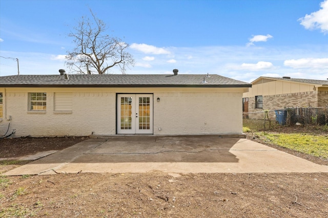 rear view of property with a patio and french doors