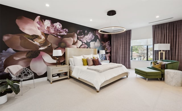 bedroom with light colored carpet