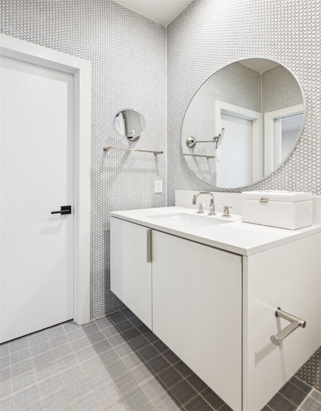 bathroom with vanity and tile patterned flooring