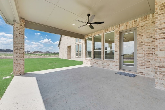 view of patio / terrace featuring ceiling fan