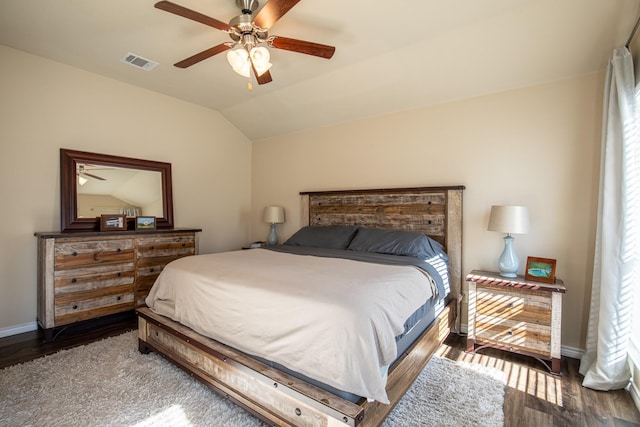 bedroom with lofted ceiling, hardwood / wood-style floors, and ceiling fan