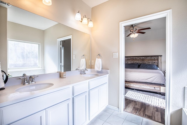 bathroom featuring vanity, tile patterned floors, and ceiling fan