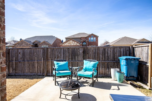 view of patio / terrace featuring an outdoor fire pit