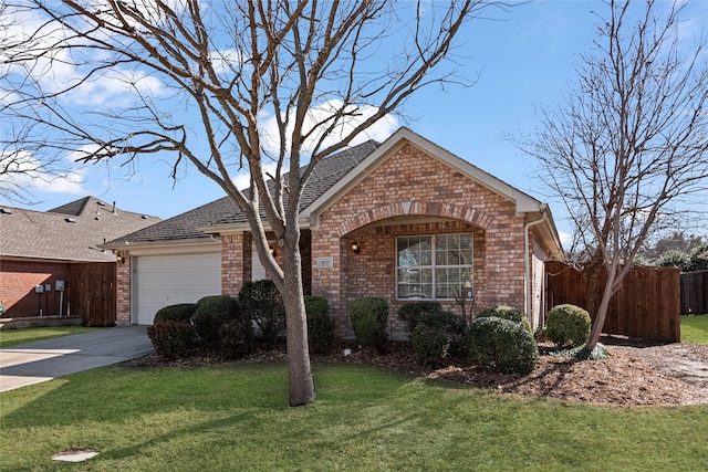 view of front facade with a garage and a front lawn