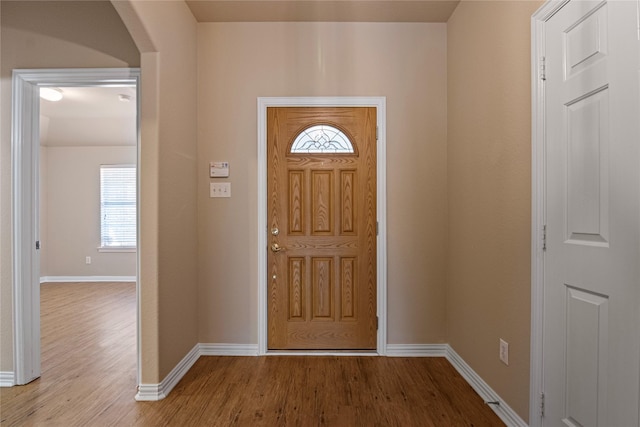 foyer entrance with light hardwood / wood-style floors