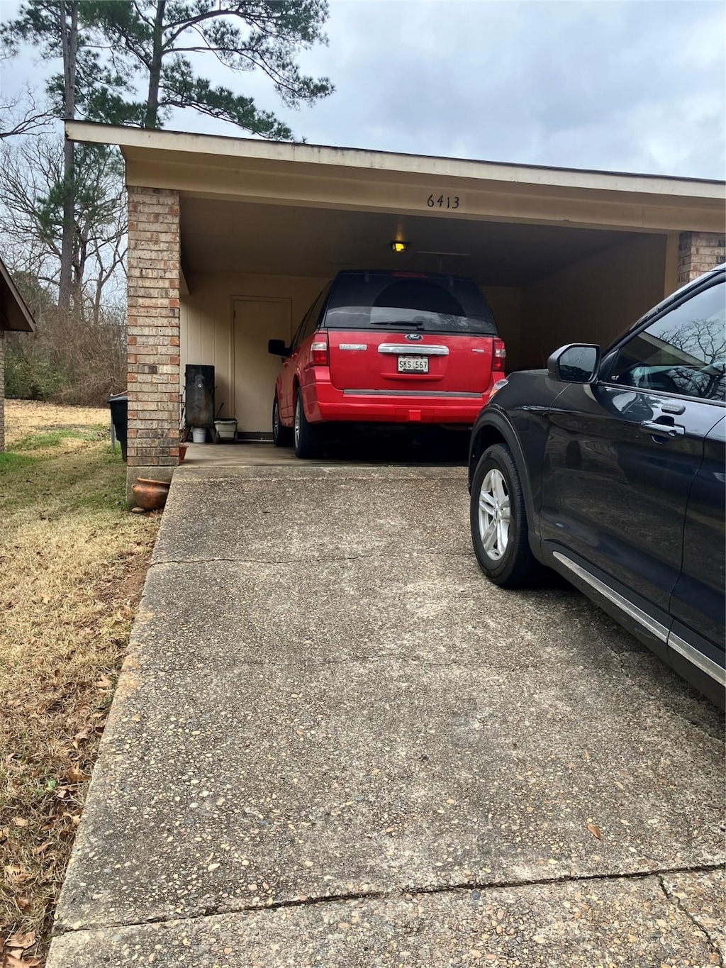 view of car parking with a carport