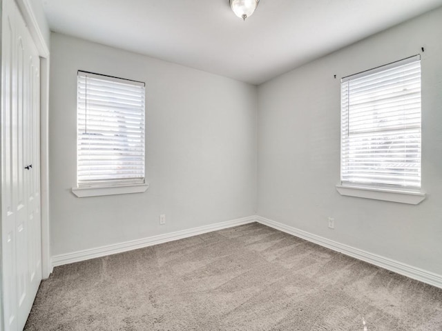 view of carpeted spare room