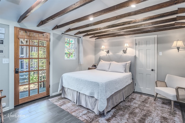 bedroom featuring dark hardwood / wood-style flooring, access to outside, and beamed ceiling