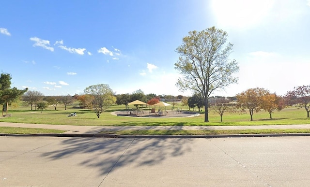 view of property's community with a gazebo and a lawn