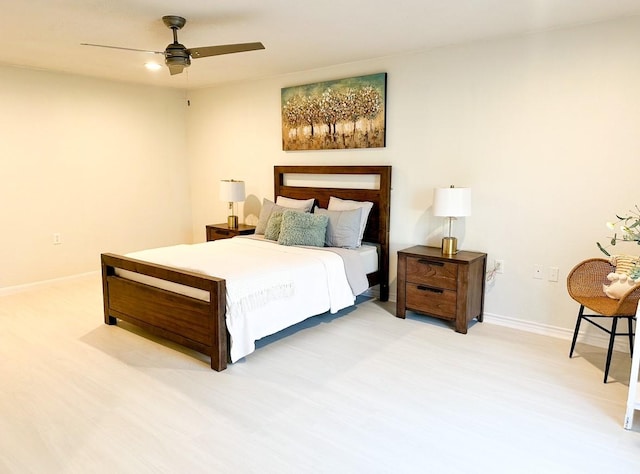 bedroom with wood-type flooring and ceiling fan