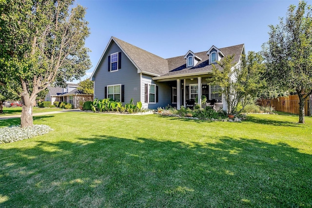 view of front of property featuring a front yard