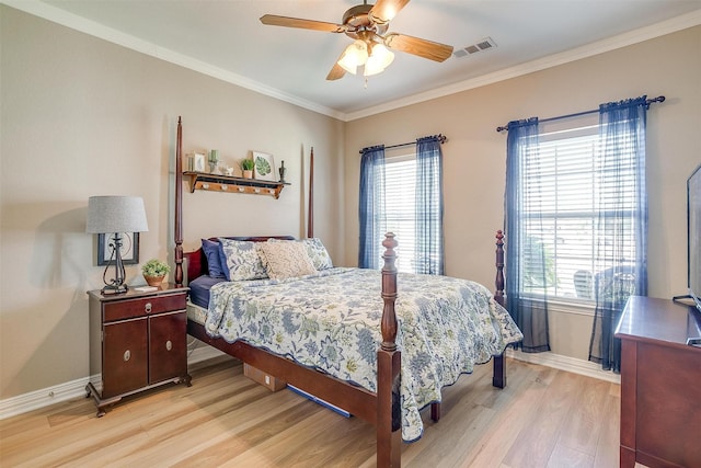 bedroom with crown molding, multiple windows, ceiling fan, and light hardwood / wood-style flooring