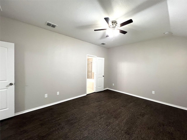 unfurnished room featuring hardwood / wood-style flooring, vaulted ceiling, and ceiling fan