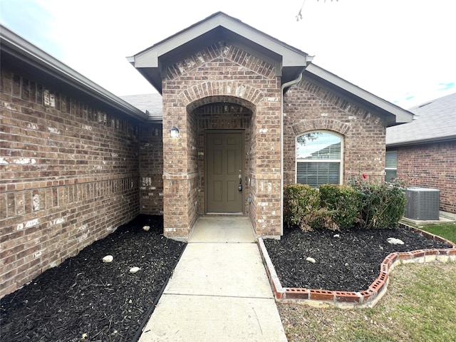 property entrance featuring cooling unit