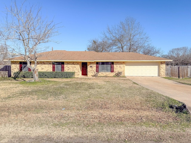 single story home with a garage and a front yard