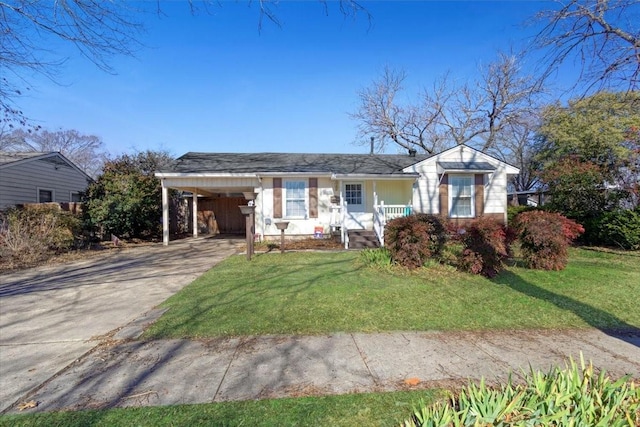 single story home with a carport and a front lawn